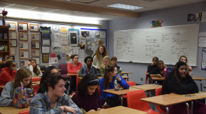 Students engaged and participating during class. Back to school night gives parents an opportunity to experience their students daily life.