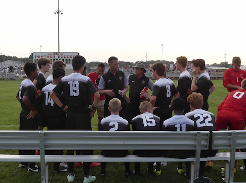 The boys soccer team huddled up during their game against Pike. The boys soccer team started their season with a victory against Warren Central.