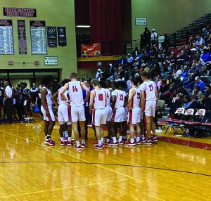Boys basketball draws first round bye in sectionals