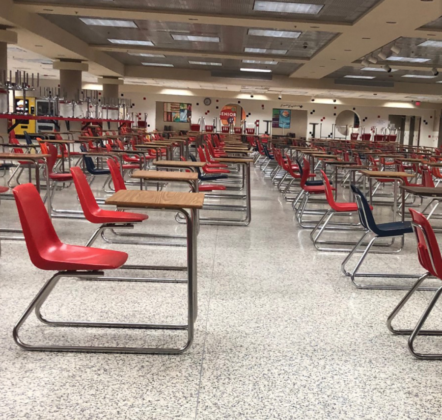 Classroom desks replace tables as students prepare to return.
