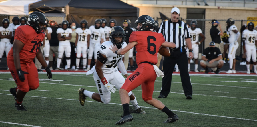 Quarterback Zayd Vestal looks to pass the ball during the Panther victory against Warren Central three weeks ago. North Central beat Carmel last year at their homecoming by a touchdown. The Panthers look to defeat the Greyhounds for the second year in a row tonight.
