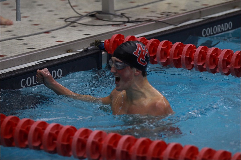 Ethan+Jaeger+celebrates+after+a+successful+race.+Jaeger+attended+school+in+Illinois+his+freshman+year+and+now+swims+varsity+here.