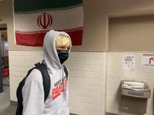 Students try to walk around the halls in hoods, even though teachers tell them to take off their hoods. 