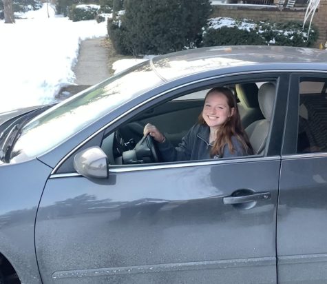 Sophomore Emery Moore drivers her car in the snow for one of the first times. This is Moores first year driving in the snow as a new driver. 