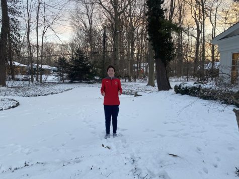 Sophomore Owen Larrimer enjoys his day off by playing in the snow once he finished his school work.