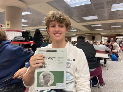 Gentile shows off his PSAT study book.