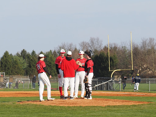 Coach McClain coaching in his first home game at North Central against Cathedral.