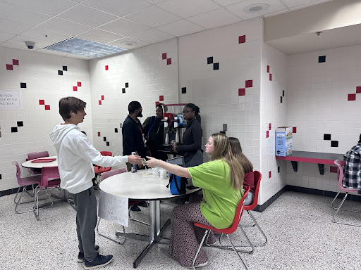 Junior Class Council sells slushies during lunch periods on March 15. All money raised from the sales was put towards the prom budget.