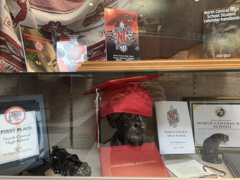 A cap and diploma are on display outside the counselors office. 