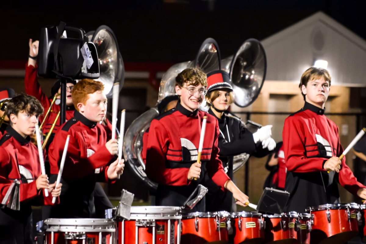 Freshman Lucas Ebersol plays with the Marching Panthers during the football game against Fishers on Aug. 23. They celebrated the fifth NC touchdown.