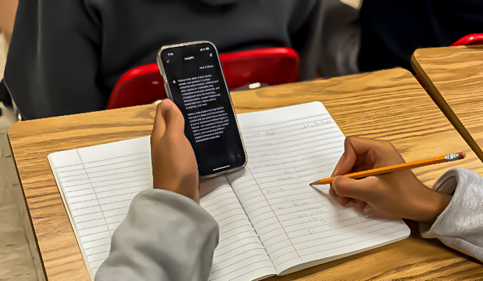 A student uses ChatGPT to complete an assignment. ChatGPT has grown in popularity among students and has become one of the most used AI platforms.