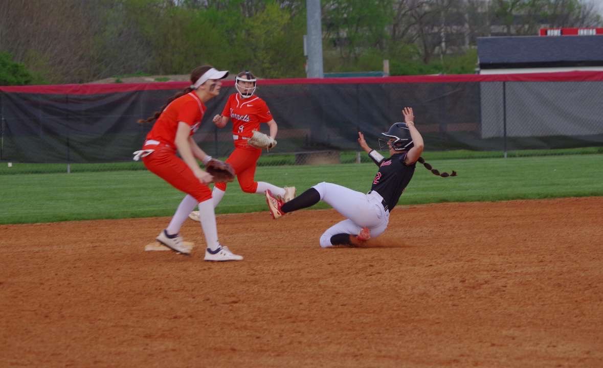 Senior Gabby Stevens slides to third base against Beech Grove last season. NC beat Beech Grove 9-4.