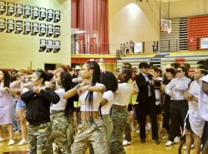 Students dance with their respective outfit theme at the 2023 Dance-a-Thon. Every team participating in the Dance Marathon had their own themes in order to tell who is on what team. 