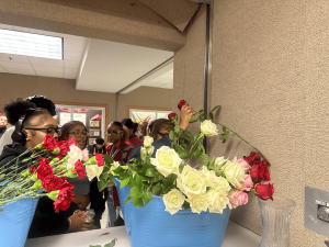 Student council sells flowers and cnady grams during lunch periods. Flowers are seen as an expression of love.