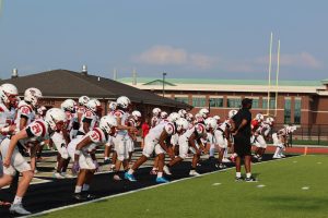 Varsity football preparing for scrimmage against Noblesville.