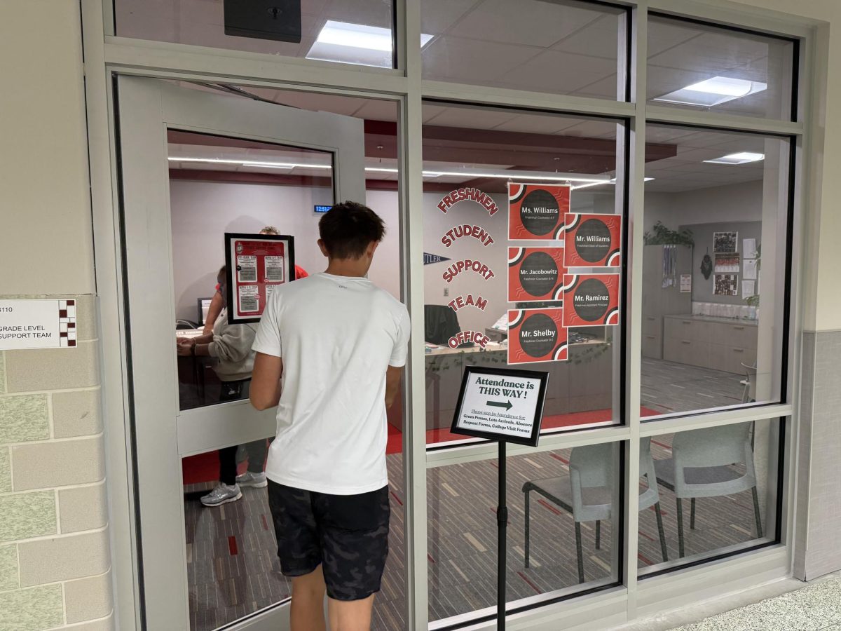 Freshman Tyler Gilvin visiting his counselors office in B10.