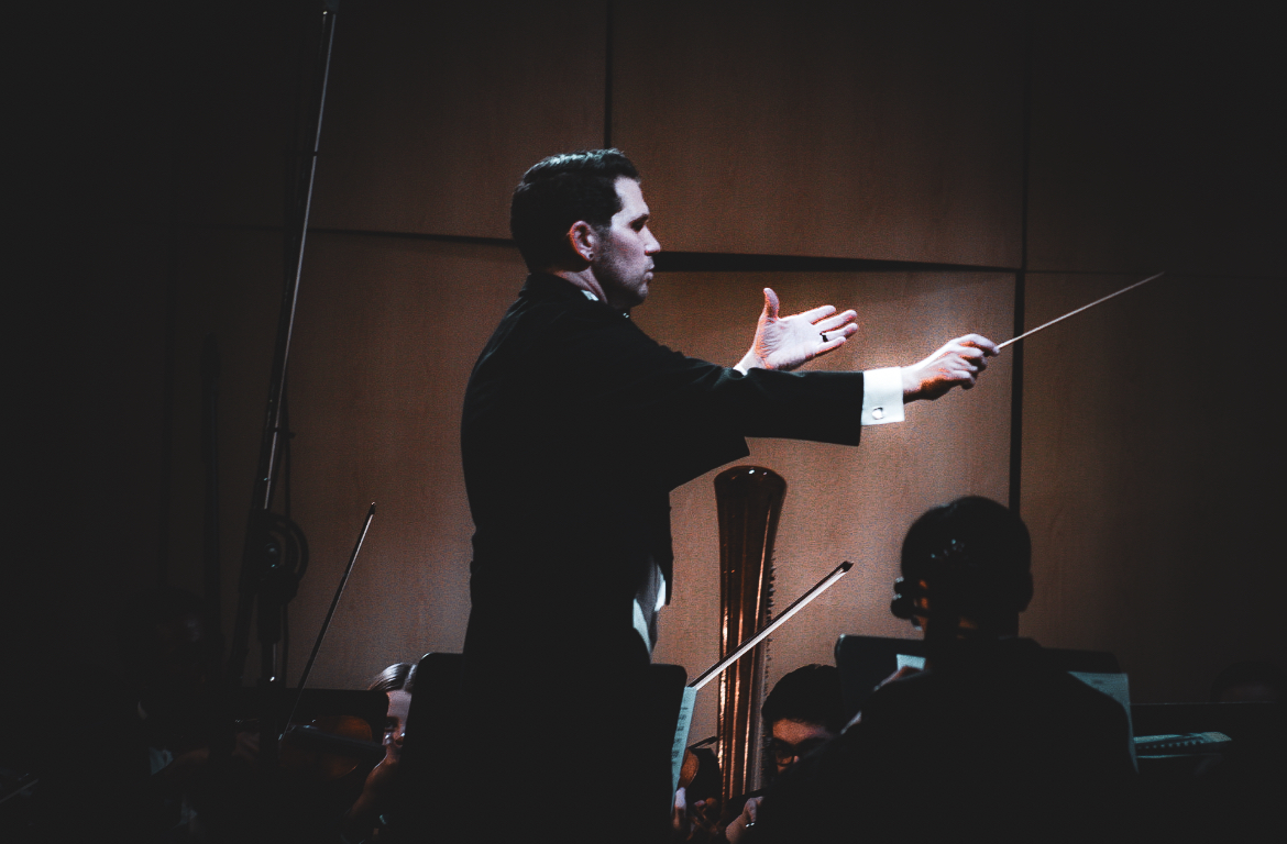 Orchestra director Elliot Lentz conducts the Advanced Symphony Orchestra during the Dick Dennis Memorial Concert. The concert is annual, taking place every January. 
