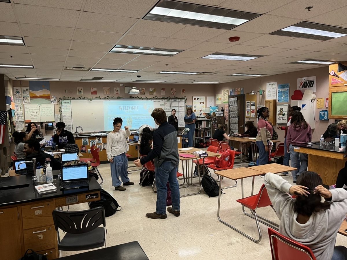 Students in AVID class are collaborating ideas. The AVID curriculum encourages collaboration and talking to others