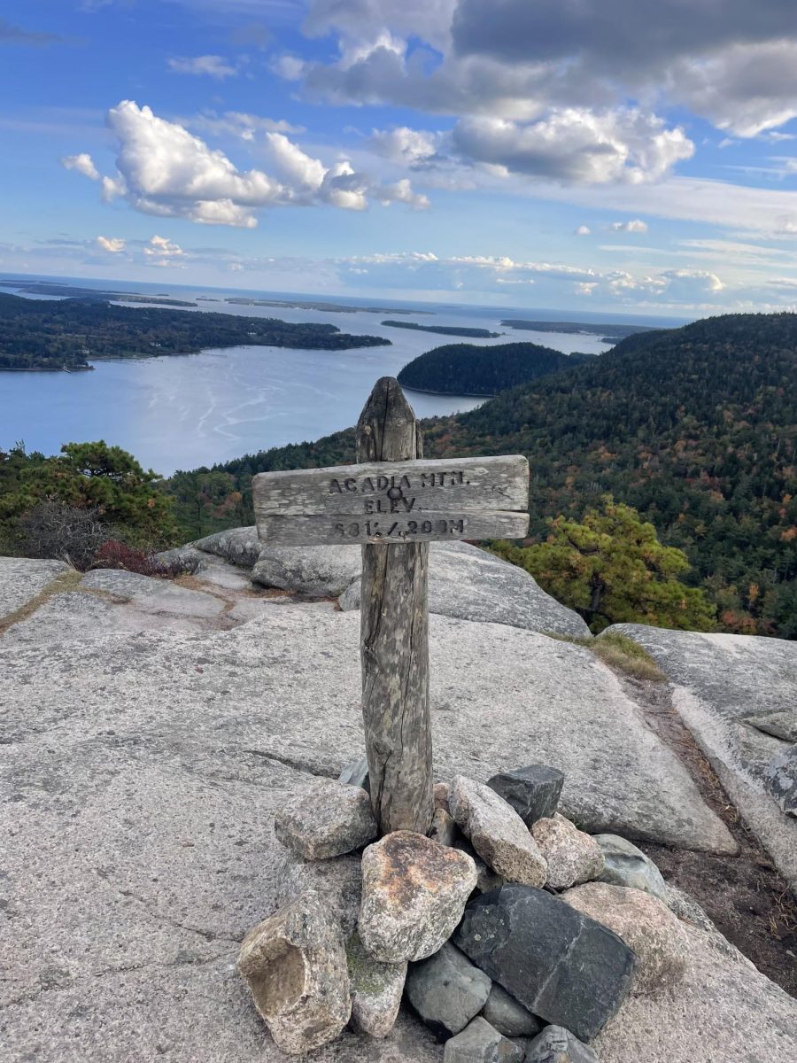 This picture was taken at the top of Acadia Mountain, located in Acadia National Park. The park  is a very popular tourist destination during fall break. 