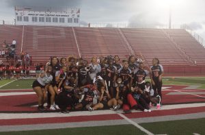 The girls flag football team celebrating after defeating Pike 12-0. The game was the first  in program history and the start of an incredible season. “We were always focused on the game in front of us, so  we could get to that next step,” Hampton said.