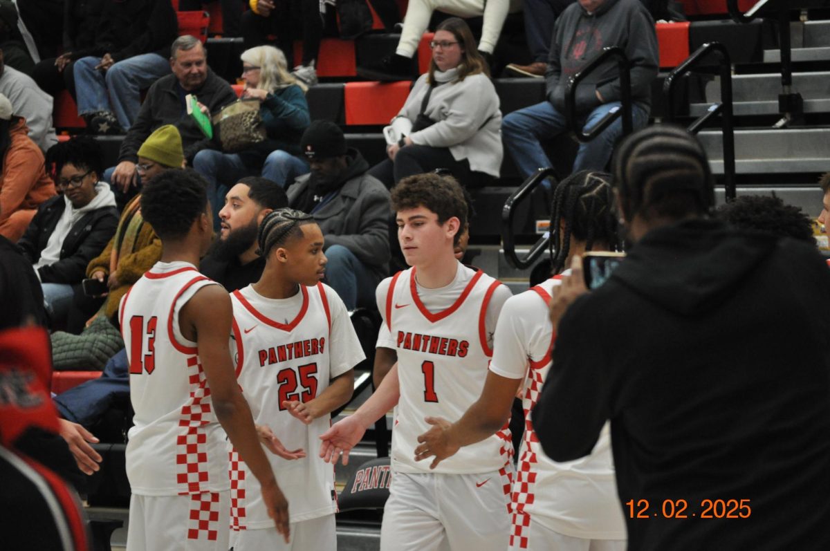 Junior guard Bryce Harris during player introductions before playing Crispus Attucks. The Panthers are 2-0 to start the year and are ranked 24th in the IndyStar week two Super 25. “Students should expect a hardworking team this year. We know we have a lot to prove and we are just trying to get better everyday we are in the gym,” Johnson said.