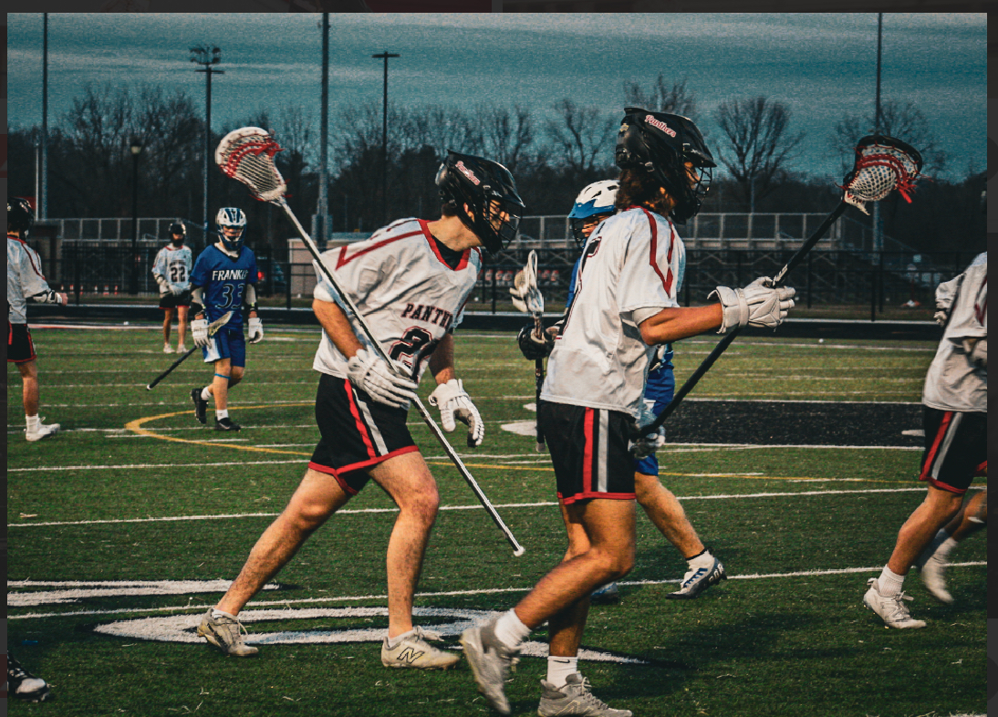 Captian, junior Cameron Dougherty playing agsint Franklin Central. “My favorite part of NC lacrosse is the family and the culture. It is just fun,” freshman Evan Dougherty said. 