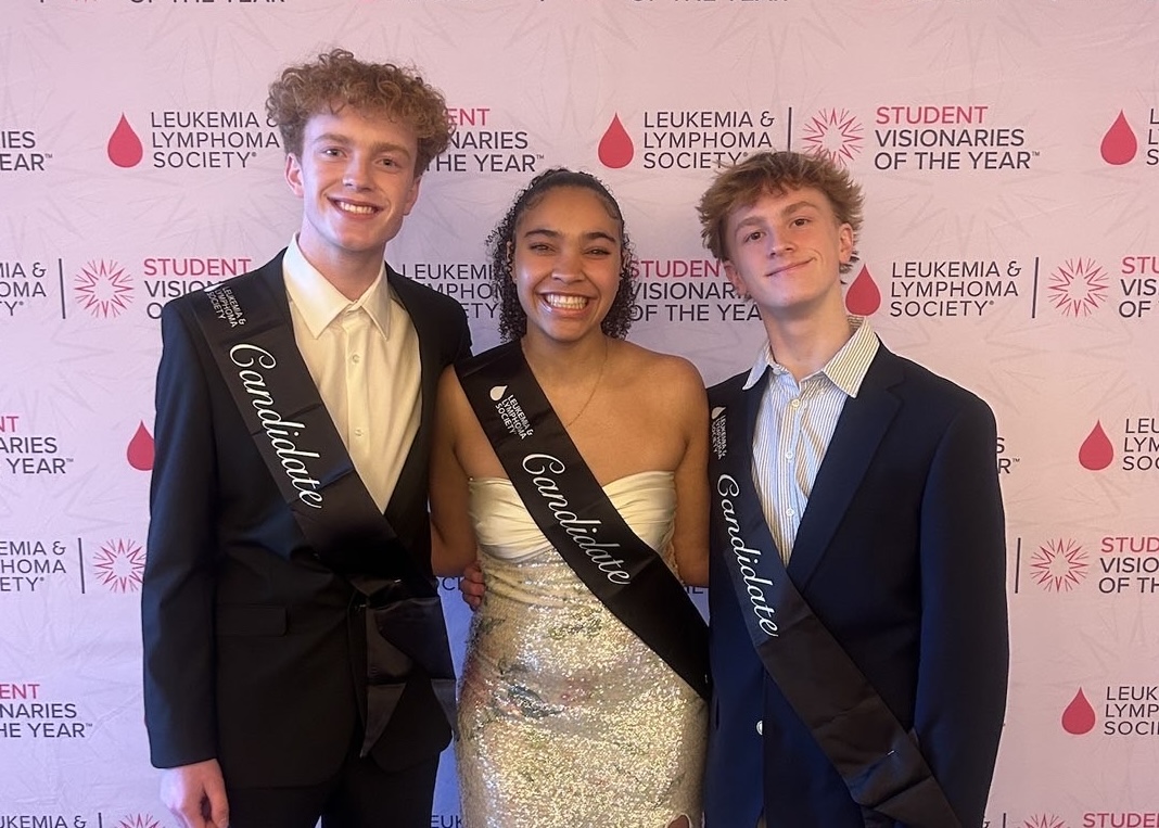 Junior Kaya Avery (middle), Pictured with her student visionaries team (left and right) at LLS Grand Finale.“LLS supports the community by raising money that goes towards finding cures while helping families that can be struggling” Avery said.