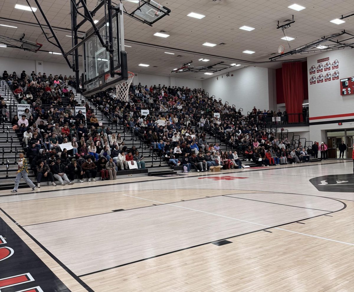 Students from the Obsidian and Quartz house meet in the main gym for a house assembly. Houses competed against each other in games and events, Quartz ultimately defeated the Obsidian house.