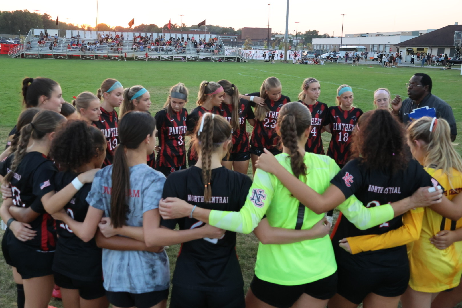 North Central Girls soccer pregame team huddle prepairing for senior night. The North Central Girls won three to zero against Lawrence Central."It was so amazing to see all of our fans come support us," senior Erin Mackey said.