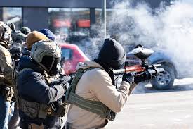 Created in 2003 by depertment of homeland security. This photo shows ICE during a raid.
