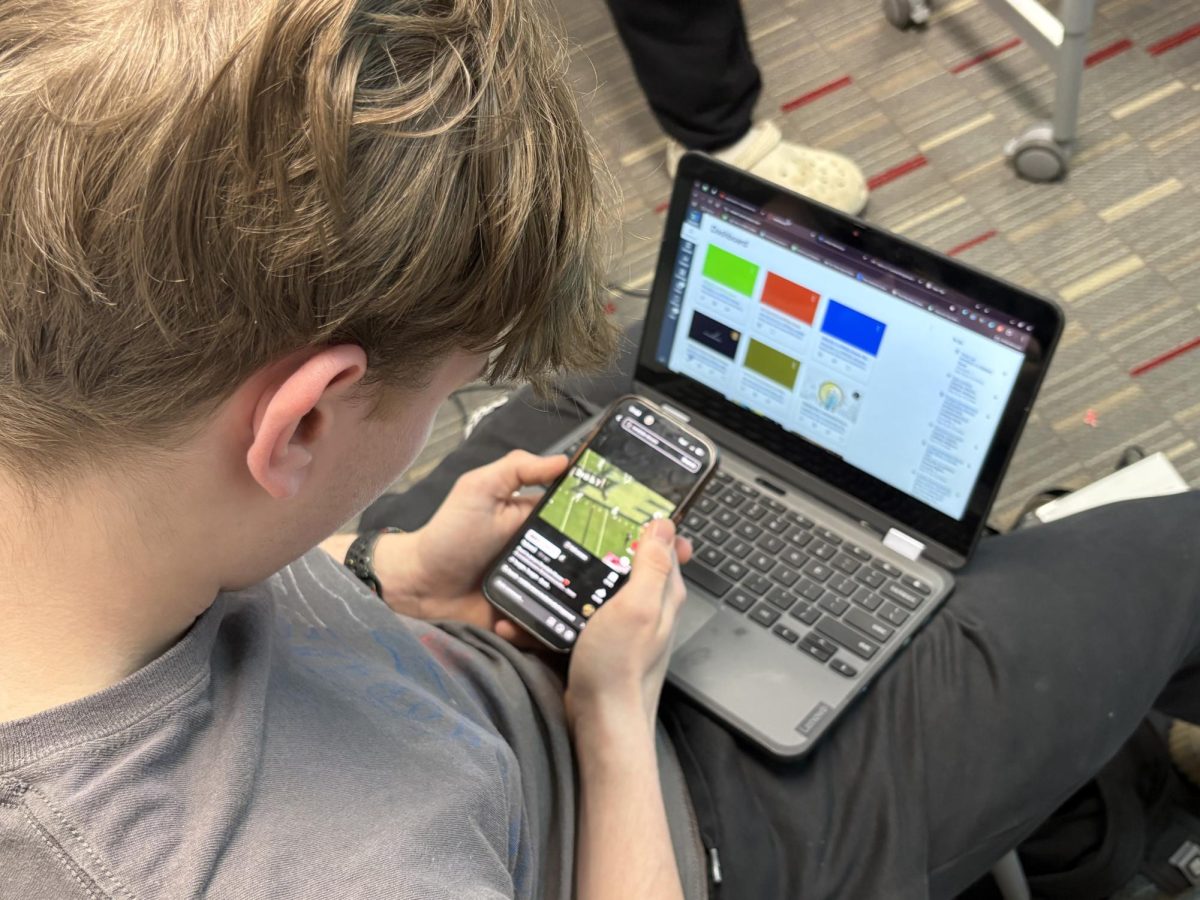 Long time Purdue fan senior PJ Wever watches Rondale Moore highlights on Tiktok.
