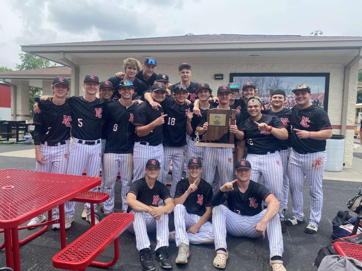 he North Central baseball team gathers for a team photo following their 6-3 regional victory over Greenfield Central. The regional title was their first since 1994.